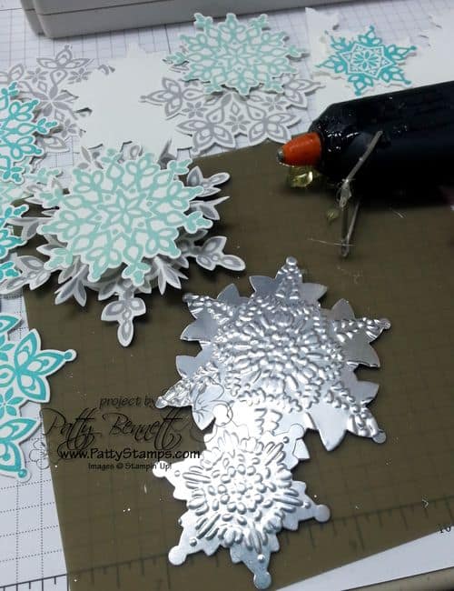 Cindee-snowflake-silver-paper-embossed