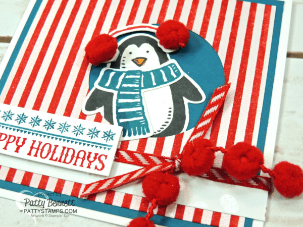 Red pom pom trim mades a cute embellishment or ear muffs for this cute Snow Place penguin from Stampin' Up!. Handmade card by Patty Bennett