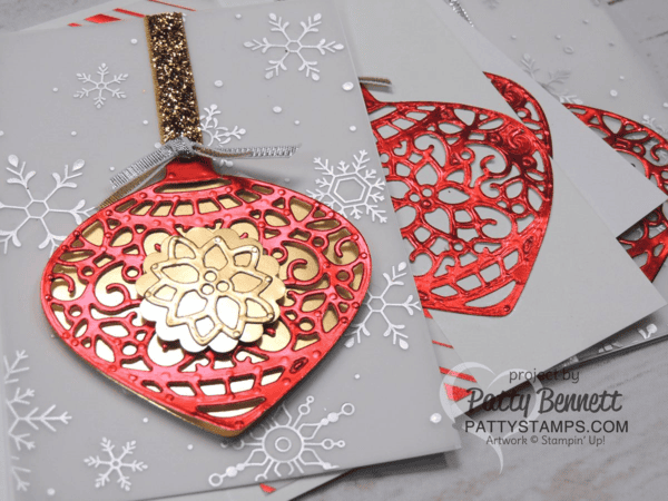 Red and Gold foil Christmas cards featuring Stampin' Up! Delicate Ornament thinlit dies. Silver foil snowflakes and red striped foil vellum from the Holidays Fancy Foil Vellum pack. Christmas cards by Patty Bennett at pattystamps.com Red and Gold foil Christmas cards featuring Stampin' Up! Delicate Ornament thinlit dies. Silver foil snowflakes and red striped foil vellum from the Holidays Fancy Foil Vellum pack. Christmas cards by Patty Bennett at pattystamps.com