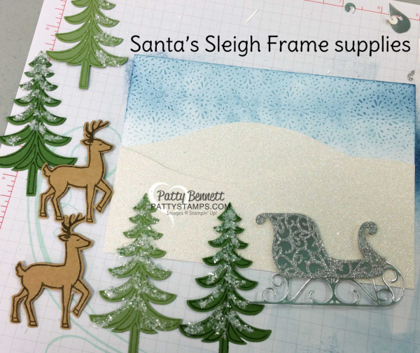Supplies for framed Christmas Santa's Sleigh home decor piece.