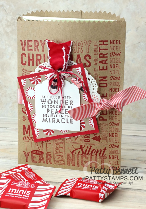 Christmas 3x3 square on kraft gift bag, featuring Stampin Up stamps, paper, ink. Merry Medley background stamp. Christmas 3x3 square on kraft gift bag, featuring Stampin Up stamps, paper, ink. Merry Medley background stamp.