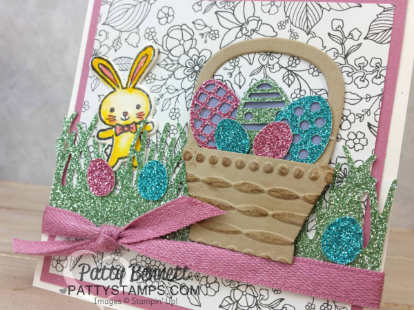 Easter Basket card featuring stamps and framelits from the Stampin' Up! Basket Bunch bundle, and Sale a Bration Glimmer paper and Inside the Lines paper. Handstamped card by Patty Bennett