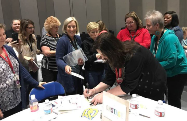 Stampin Up! OnStage local convention - Patty signing the Ribbon of Courage stamp sets