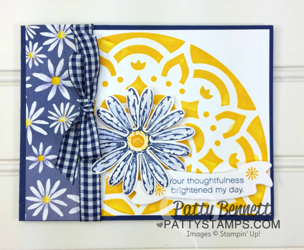 Daisy Delight bundle card idea featuring Stampin' UP! embossing paste, medallion mask, Daisy Delight stamp set and punch and Delightful Daisy designer paper. Topped off with Night of Navy Ginham ribbon. By Patty Bennett