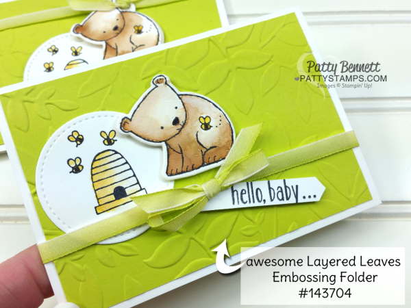 Baby card idea featuring Stampin' UP! A Little Wild bear stamp and matching Little Loves framelit dies.  Bee Hive and bees stamped on Stitched Shape framelits. Layered Leaves embossing folder background. Card by Patty Bennett