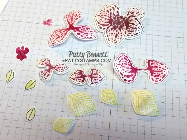 Die Cut pieces to assemble the climbing orchid flowers from Stampin' Up!.  Curl each petal with a bone folder and color with clear wink of stella!