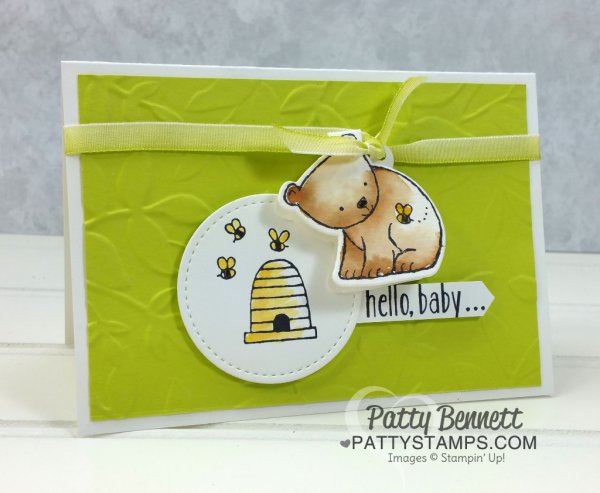 Baby card idea featuring Stampin' UP! A Little Wild bear stamp and matching Little Loves framelit dies.  Bee Hive and bees stamped on Stitched Shape framelits. Layered Leaves embossing folder background. Card by Patty Bennett