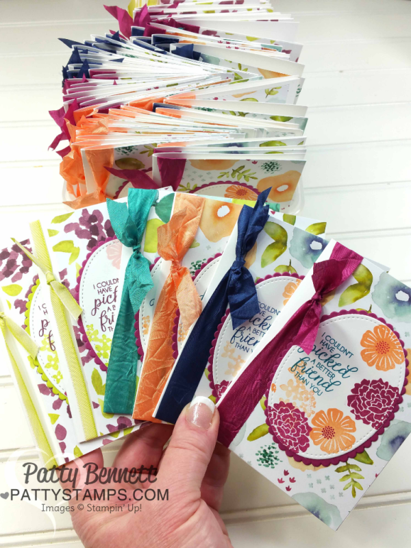 Handstamped note cards featuring Stampin' UP! Naturally Eclectic designer floral printed paper, Beautiful Bouquet stamp set, and ribbon accent. By Patty Bennett