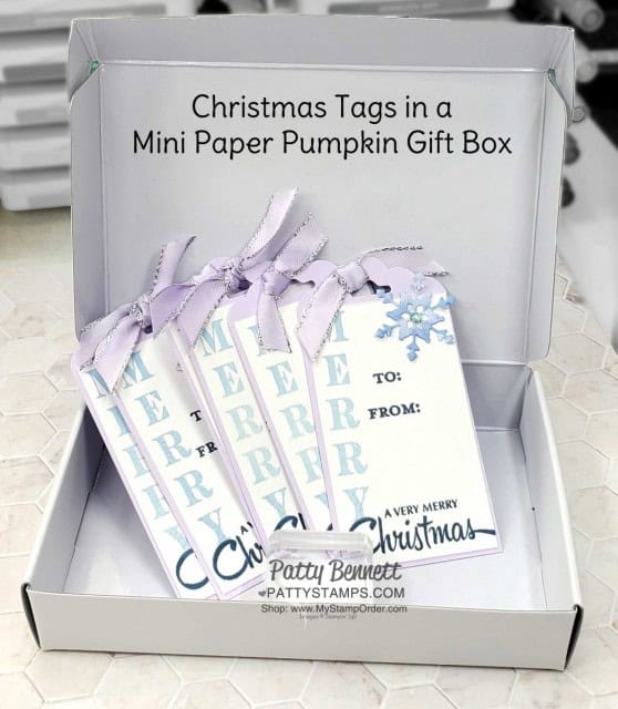 Christmas gift box full of gift tags, created with Snowflake Splendor papercrafting supplies from Stampin' UP!: Decorated Mini Paper Pumpkin box featuring Blue Glimmer Paper snowflakes. www.PattyStamps.com