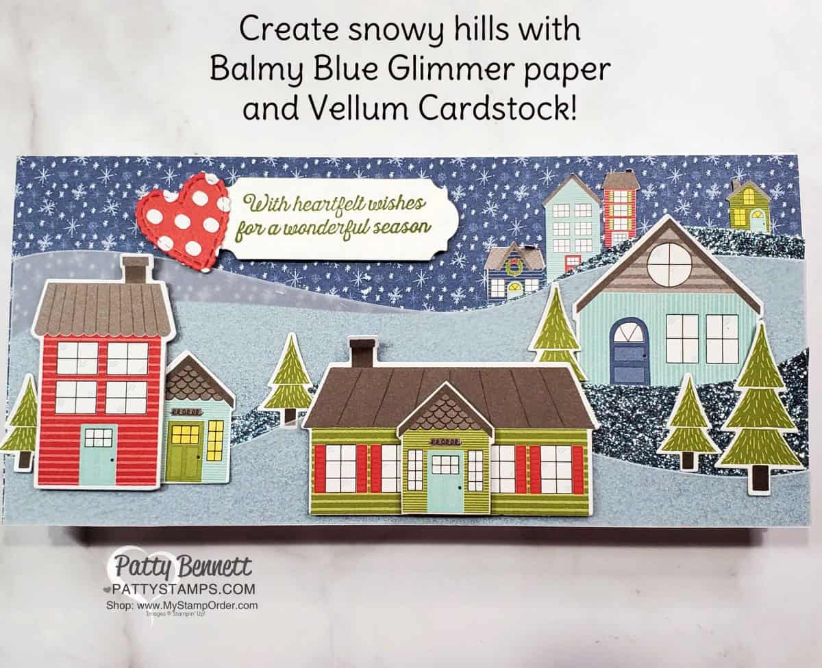 Stampin' UP! Trimming the Town designer paper slimline card idea with Balmy Blue Glimmer paper and vellum snowy hills. by Patty Bennett