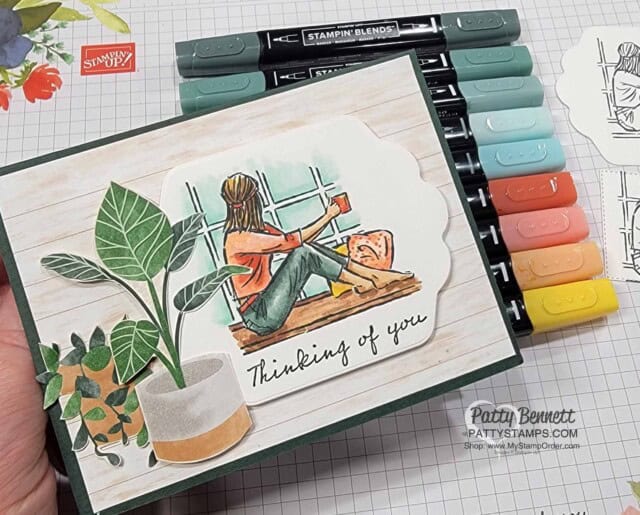 In the Moment stamp set "lady in the window" image colored with Stampin' Blends markers and plants from the Bloom Where you are Planted DSP pack. by Patty Bennett