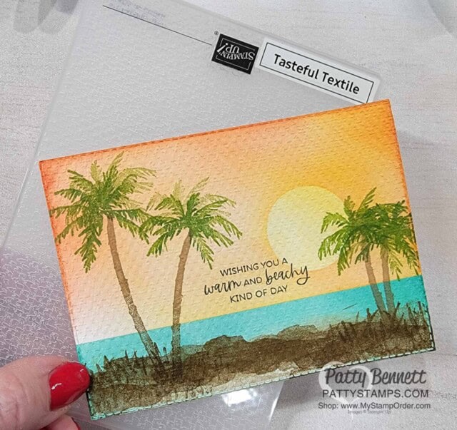 Beautiful sunset card idea featuring Stampin' Up! Paradise palms set, ink and blending brushes and Tasteful Textile embossing folder, by Patty Bennett. Free Video Tutorial!