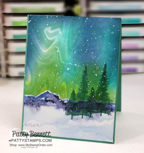 Use Stampin' UP! Simply Marbelous Sale-a-Bration paper to create an ink blended sky for the Northern Lights. by Patty Bennett