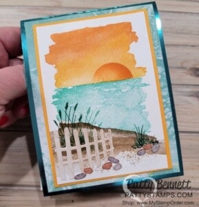 Sunset card: Oceanfront card featuring the Horizons dies fence and pebbles, by Patty Bennett