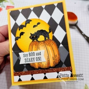 Halloween card idea featuring Stampin' UP! Scary Cute bundle cat with black glimmer paper and Hello Harvest pumpkin, by Patty Bennett