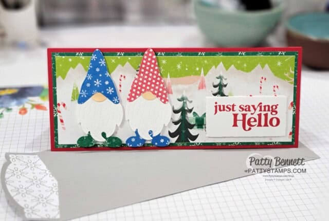 Slimline card idea featuring Kindest Gnomes bundle from Stampin' UP! - so fun to make Gnomes with designer paper, like paper dolls. Santa Express paper background.