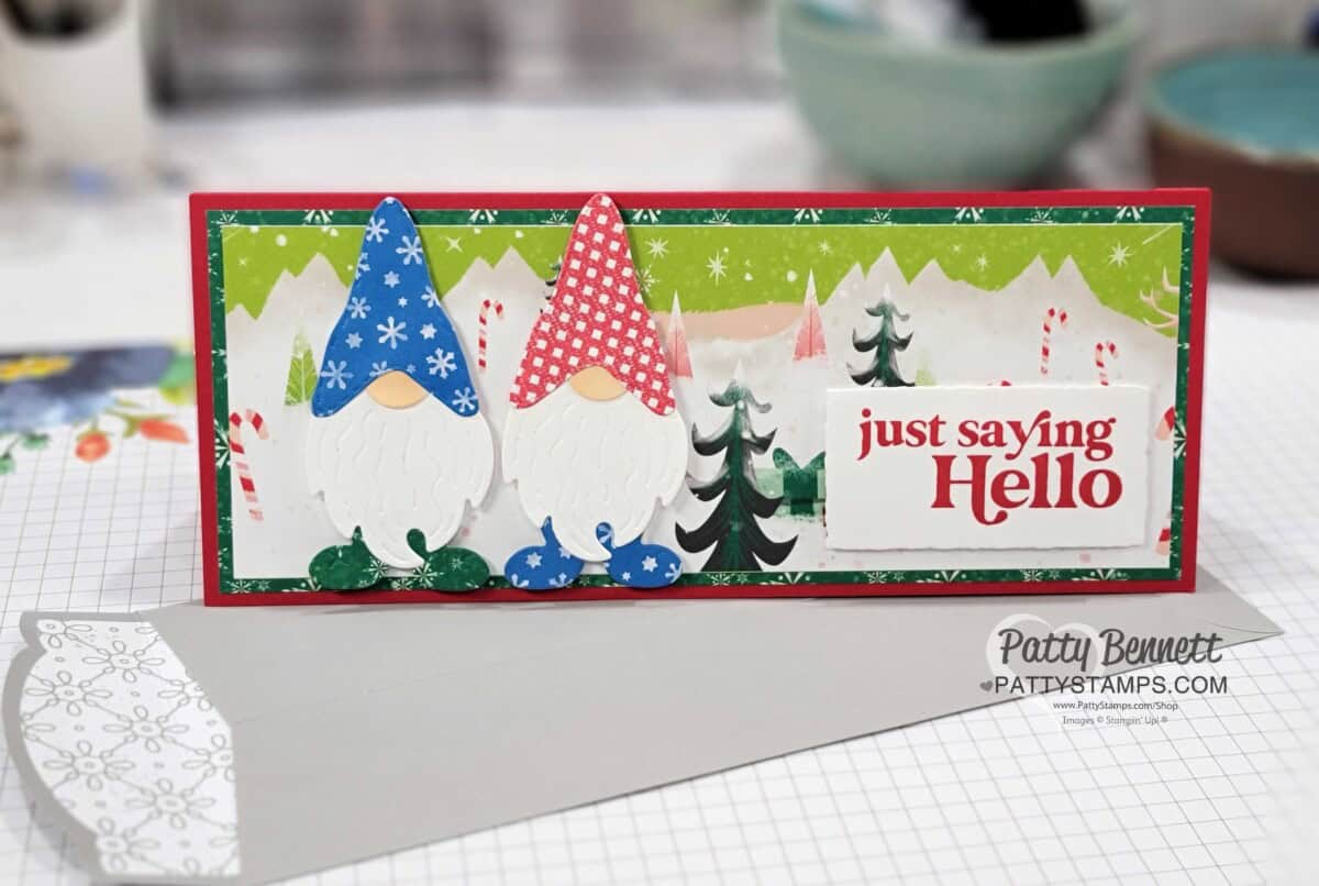 Slimline card idea featuring Kindest Gnomes bundle from Stampin' UP! - so fun to make Gnomes with designer paper, like paper dolls. Santa Express paper background.
