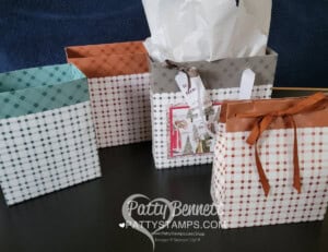 Handmade gift bag featuring Stampin' Up! 12x12 Tartan Foil plaid designer paper by Patty Bennett