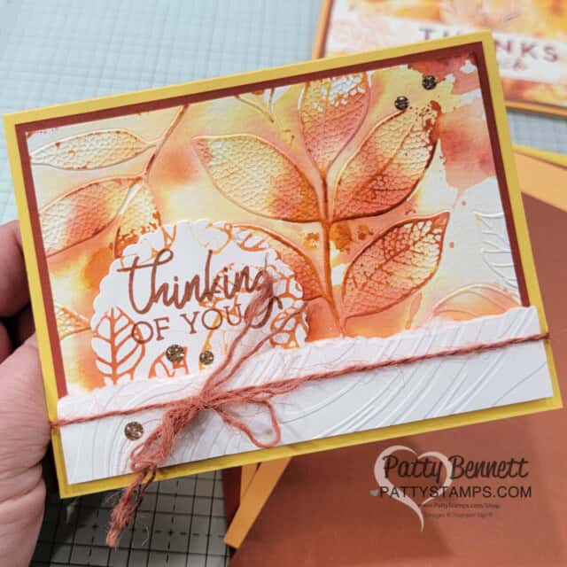 Changing Leaves Hybrid Embossing folder card idea featuring a fall color combo watercolor wash background, by Patty Bennett