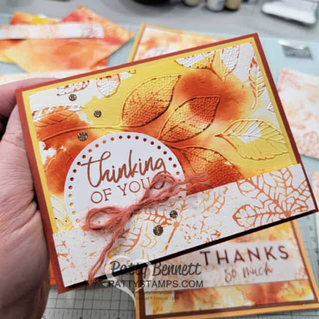 Changing Leaves Hybrid Embossing folder card idea featuring a fall color combo watercolor wash background, by Patty Bennett
