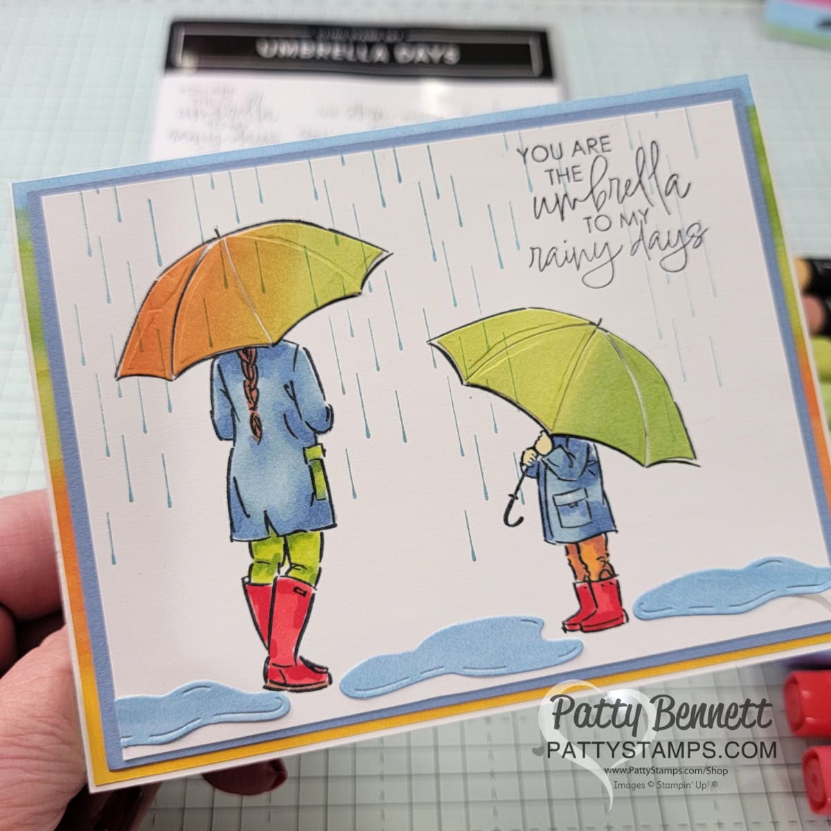 Simple card with Stampin' Up! Umbrella Days stamp set and Stampin Blends coloring by Patty Bennett