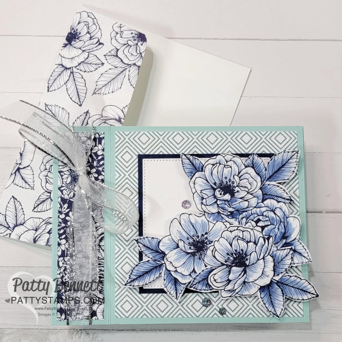 Book binding edge card with Stampin' Up! special release Serene Love paper. Flowers colored with Blender Pen, by Patty Bennett