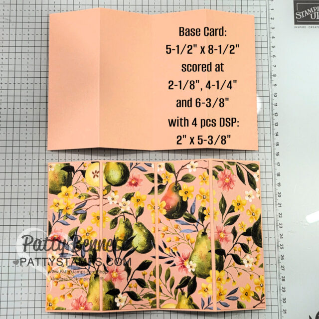 A peach-colored card base is scored and folded into four panels, with floral and fruit-patterned paper strips adhered to the front. Instructions and measurements for cutting and scoring the card and paper strips are printed on the upper right panel. To read more, visit Patty Stamps (pattystamps.com)