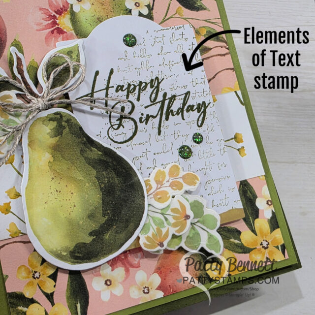 A handmade birthday card features floral and painterly pears illustrations, with a script background and "Happy Birthday" text in green. Embellishments include twine, green gems, and a pattystamps "Elements of Text stamp" label with an arrow. To read more, visit Patty Stamps (pattystamps.com)