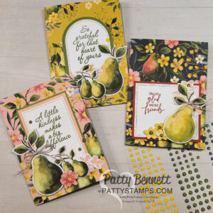 Three handmade greeting cards feature pears, flowers, and leaves on floral patterned backgrounds. Each card has a gratitude or friendship message in elegant script. The photo also shows yellow and green gem embellishments and a watermark reading "PattyStamps.com. To read more, visit Patty Stamps (pattystamps.com)