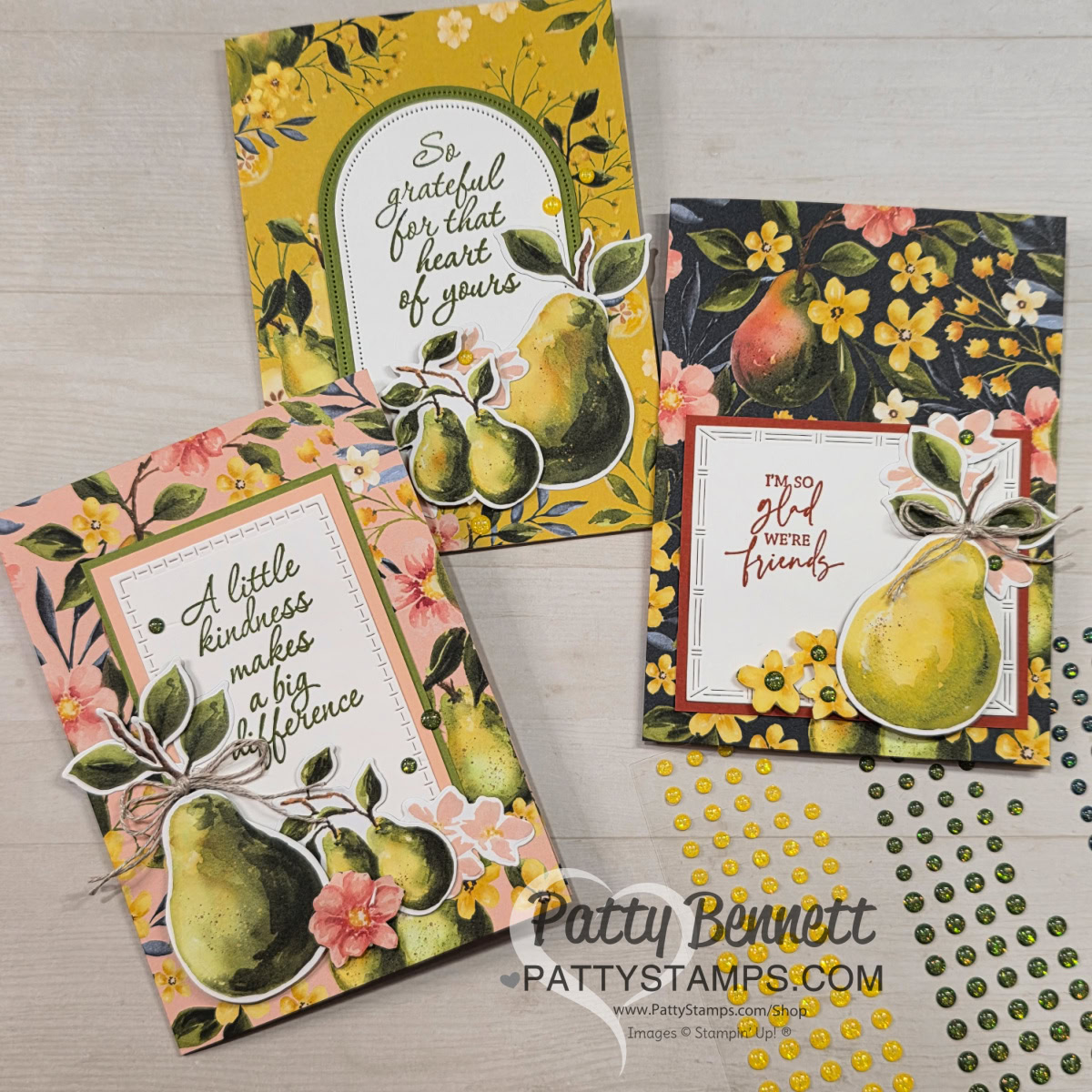 Three handmade greeting cards feature pears, flowers, and leaves on floral patterned backgrounds. Each card has a gratitude or friendship message in elegant script. The photo also shows yellow and green gem embellishments and a watermark reading "PattyStamps.com. To read more, visit Patty Stamps (pattystamps.com)