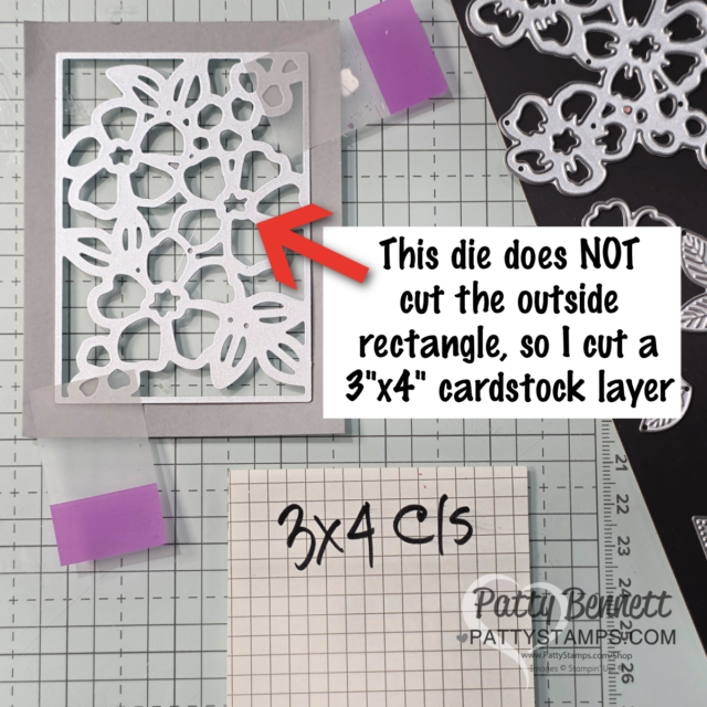 A metal floral die is taped to a 3"x4" white cardstock on a gridded surface. An arrow points to the die cut area with text: "This die does NOT cut the outside rectangle, so I cut a 3''x4'' cardstock layer." A grid note reads "3x4 C/S. To read more, visit Patty Stamps (pattystamps.com)