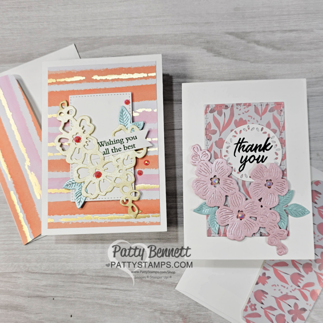 Two handmade greeting cards with floral designs rest on a gray surface. The left card has pink, gold, and white stripes, a gold floral embellishment, and a message reading “Wishing you all the best.” The right card features pink flowers and a “thank you” message. To read more, visit Patty Stamps (pattystamps.com)