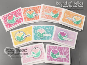 Ten colorful handmade note cards are spread in a semi-circle on a table. Each features a floral design, patterned background, and sentiments like "Thank you," "hello," "Happy Birthday," and "Just a note." "Patty Bennett PattyStamps.com" watermark is visible. To read more, visit Patty Stamps (pattystamps.com)