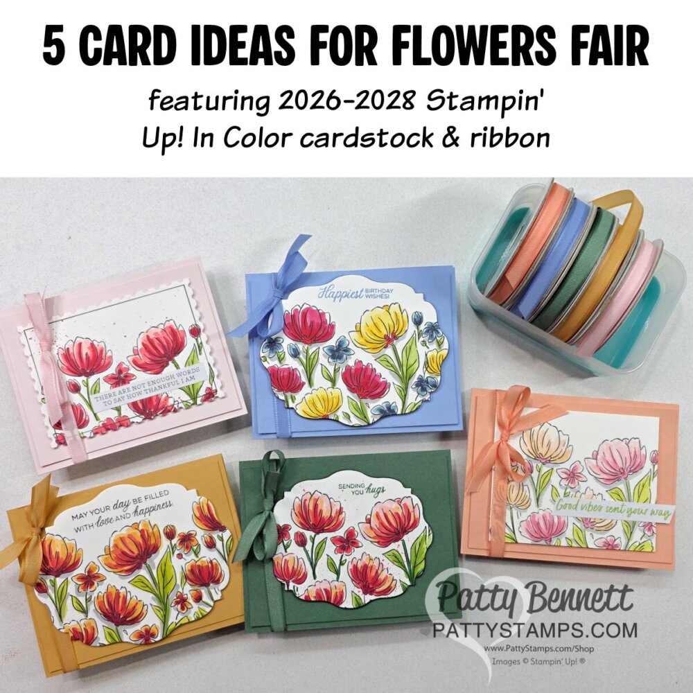 Five handmade floral greeting cards in pastel colors—pink, blue, yellow, green, and peach—are displayed on a white surface, each decorated with stamped and colored flowers, matching ribbons, and handwritten sentiments. Assorted spools of colored ribbon sit in the upper right. To read more, visit Patty Stamps (pattystamps.com)