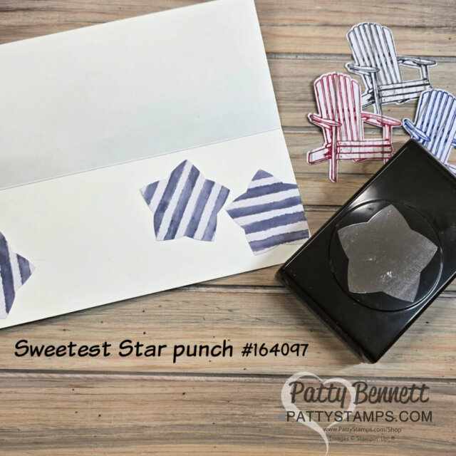 A handmade card features three blue-striped star shapes along the bottom. Beside the card is a black star-shaped paper punch with a star cutout. In the background are three colorful paper Adirondack chairs. The text reads “Sweetest Star punch #164097.”. To read more, visit Patty Stamps (pattystamps.com)